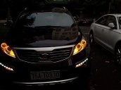 Cần bán gấp Kia Sportage R TLX đời 2010, màu đen