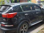 Cần bán gấp Kia Sportage R TLX đời 2010, màu đen