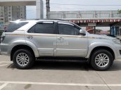 Cần bán xe Toyota Fortuner G đời 2014, màu bạc, biển Hà Nội