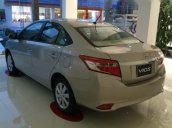 Bán xe Toyota Vios 1.5E đời 2016, màu nâu vàng