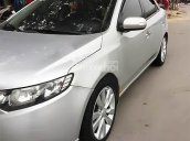 Cần bán lại xe Kia Cerato đời 2010, màu bạc, xe nhập chính chủ