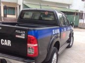 Cần bán gấp Toyota Hilux đời 2014, màu đen số sàn