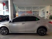 Cần bán xe cũ Toyota Corolla altis 2.0V đời 2015, màu bạc, 900 triệu