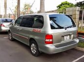 Bán ô tô Kia Carnival GS năm 2009, màu bạc xe gia đình