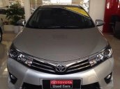 Cần bán xe cũ Toyota Corolla altis 2.0V đời 2015, màu bạc, 900 triệu