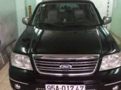 Cần bán Ford Escape đời 2004 xe gia đình