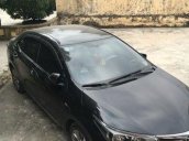 Xe Toyota Corolla altis đời 2015, màu đen số sàn 