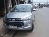 Bán xe cũ Toyota Innova E đời 2016, màu bạc