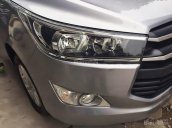 Cần bán xe cũ Toyota Innova 2.0E đời 2016, màu bạc