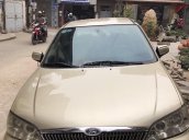 Cần bán gấp Ford Laser đời 2003, màu vàng