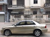 Cần bán gấp Ford Laser đời 2003, màu vàng