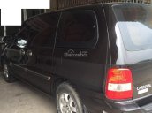 Cần bán xe Kia Carnival đời 2006, màu đen, 300 triệu