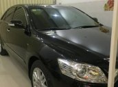 Bán xe cũ Toyota Camry 3.5Q năm 2010, màu đen chính chủ, giá tốt