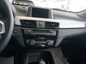 Euro Auto BMW 4S Long Biên bán xe BMW X1 Driver 18i AT đời 2017, màu trắng, nhập khẩu