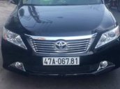 Bán Toyota Camry 2.0E năm 2013, màu đen