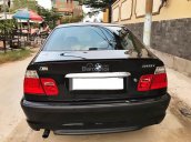 Cần bán lại xe BMW 3 Series 318i đời 2005, màu đen xe gia đình