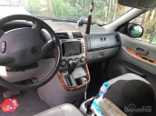 Bán xe Kia Carnival 2009 máy xăng màu đen, tặng thêm phụ kiện