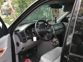 Bán xe Kia Carnival 2009 máy xăng màu đen, tặng thêm phụ kiện