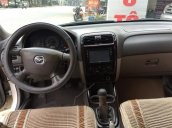 Cần bán gấp Mazda 626 đời 2002, màu trắng, số sàn, giá 245tr