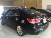 Cần bán xe Kia Cerato sản xuất 2010, màu đen, nhập khẩu Hàn Quốc, số sàn