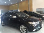 Cần bán xe Kia Cerato sản xuất 2010, màu đen, nhập khẩu Hàn Quốc, số sàn