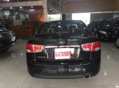 Cần bán xe Kia Cerato sản xuất 2010, màu đen, nhập khẩu Hàn Quốc, số sàn