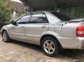 Cần bán xe cũ Mazda 323 đời 2004, màu bạc