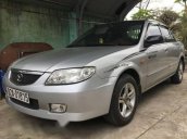 Cần bán xe cũ Mazda 323 đời 2004, màu bạc