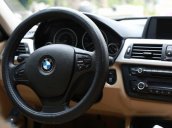 Cần bán lại xe BMW 3 Series 320i đời 2012, màu đen số tự động, giá tốt