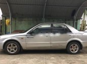 Cần bán xe cũ Mazda 323 đời 2004, màu bạc