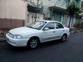 Bán xe Kia Spectra MT đời 2004, màu trắng số sàn, giá 145tr