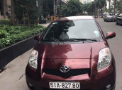 Cần bán xe Toyota Yaris màu đỏ mận, đời 2010