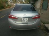 Bán xe cũ Toyota Corolla altis 1.8G AT 2015, màu bạc xe gia đình