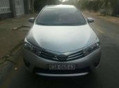 Bán xe cũ Toyota Corolla altis 1.8G AT 2015, màu bạc xe gia đình