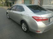 Bán xe cũ Toyota Corolla altis 1.8G AT 2015, màu bạc xe gia đình