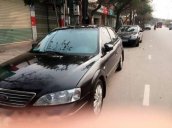 Bán Ford Mondeo đời 2004, màu đen  