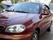 Gia đình cần bán lại xe Daewoo Lanos MT đời 2004, màu đỏ 