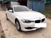 BMW 320i 2013 màu trắng nội thất kem, Full Option giao xe ngay, bán xe trả góp toàn quốc