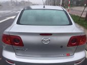 Cần bán gấp Mazda 3 AT 1.6 Sport đời 2005, màu bạc như mới