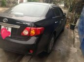 Gia đình bán xe Toyota Corolla altis đời 2010, màu đen 