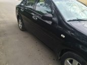 Cần bán xe cũ Daewoo Lacetti EX 2011, màu đen