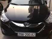 Cần bán Hyundai Tucson năm 2010, màu đen xe gia đình, giá 600tr