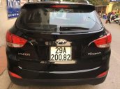 Cần bán Hyundai Tucson năm 2010, màu đen xe gia đình, giá 600tr