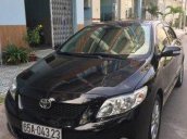 Bán lại xe Toyota Corolla AT đời 2009, màu đen