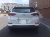 Cần bán Hyundai Tucson 2.0, màu trắng, số tự động