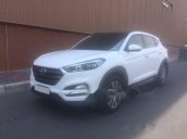 Cần bán Hyundai Tucson 2.0, màu trắng, số tự động