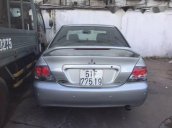 Gia đình bán lại xe Mitsubishi Lancer năm 2004, màu bạc