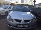 Gia đình bán lại xe Mitsubishi Lancer năm 2004, màu bạc