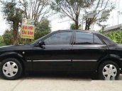 Chính chủ bán xe Ford Laser MT đời 2002, màu đen