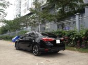 Chính chủ bán Toyota Corolla Altis 2.0V Form 2015 sx 11/2014, màu đen, biển TP. HCM số đẹp